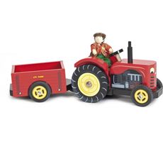 Röd traktor med släp och Bertie